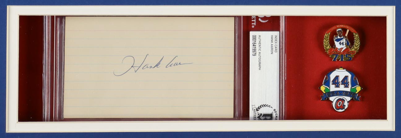 Hank Aaron Signed Custom Framed Index Card Display with Jersey, 715 Home Runs Pin & HOF Induction Pin (BGS) at PristineAuction.com Hank Aaron Signed Custom Framed Index Card Display with Jersey, 715 Home Runs Pin & HOF Induction Pin (BGS) at PristineAuction.com