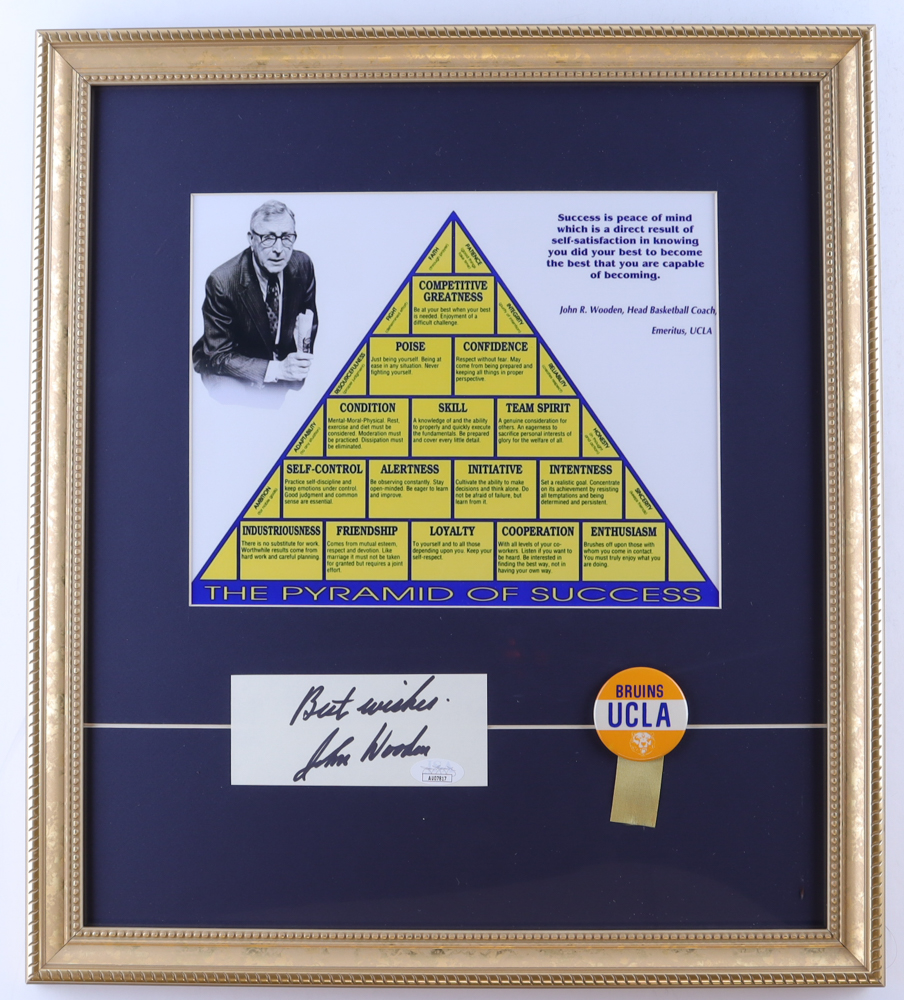 John Wooden Signed "The Pyramid of Success" Custom Framed Cut with UCLA Bruins Vintage Ribbon Pin Inscribed "Best Wishes" (JSA) at PristineAuction.com John Wooden Signed "The Pyramid of Success" Custom Framed Cut with UCLA Bruins Vintage Ribbon Pin Inscribed "Best Wishes" (JSA) at PristineAuction.com