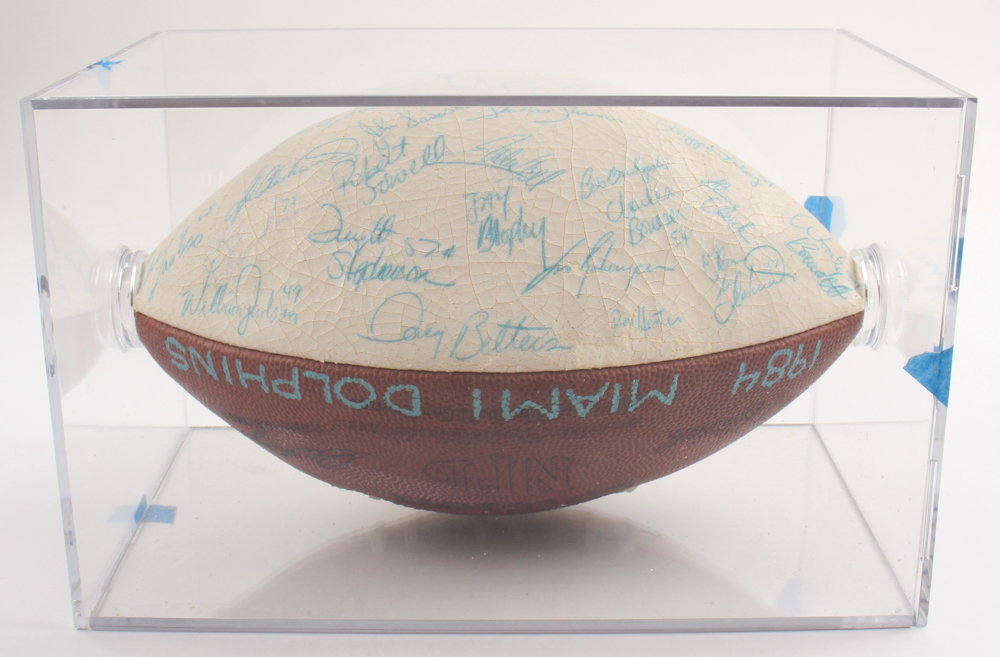 1984 Dolphins NFL Football Team-Signed By (56) with Dan Marino, Don Shula, Dwight Stephenson, Ed Newman In Display Case (JSA) at PristineAuction.com 1984 Dolphins NFL Football Team-Signed By (56) with Dan Marino, Don Shula, Dwight Stephenson, Ed Newman In Display Case (JSA) at PristineAuction.com