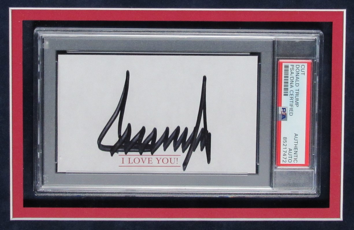 Donald Trump Signed Custom Framed Cut Display With Name Plaque (PSA) at PristineAuction.com Donald Trump Signed Custom Framed Cut Display With Name Plaque (PSA) at PristineAuction.com