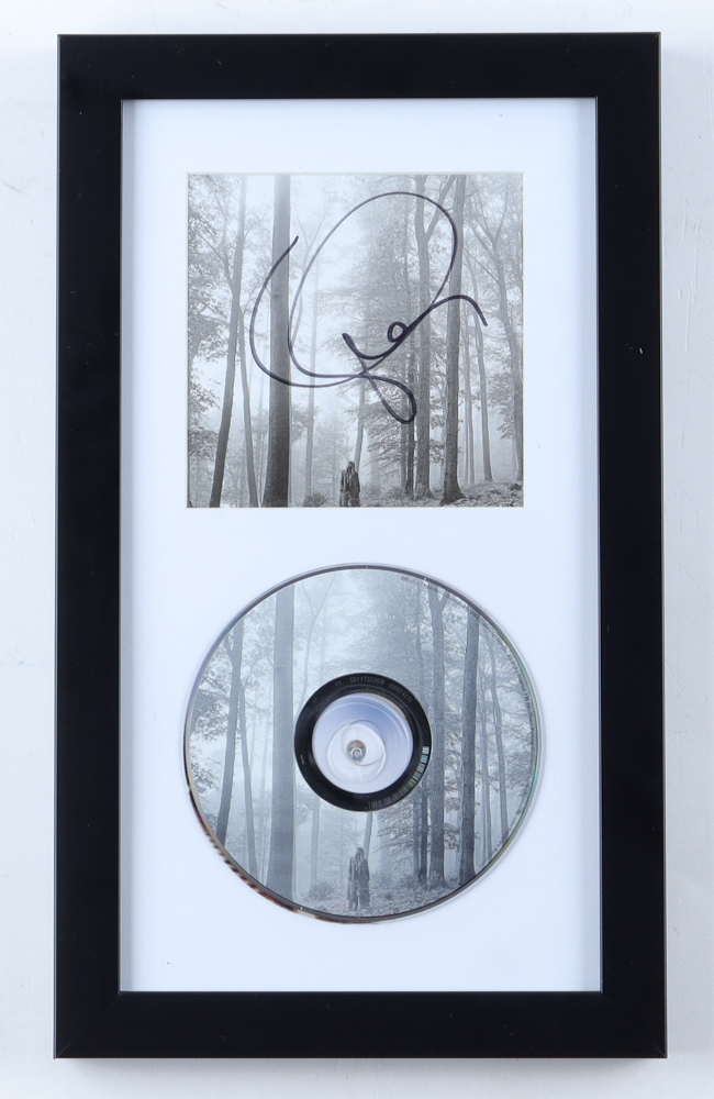 Taylor Swift Signed Custom Framed "Folklore" CD Booklet Display (JSA) at PristineAuction.com Taylor Swift Signed Custom Framed "Folklore" CD Booklet Display (JSA) at PristineAuction.com