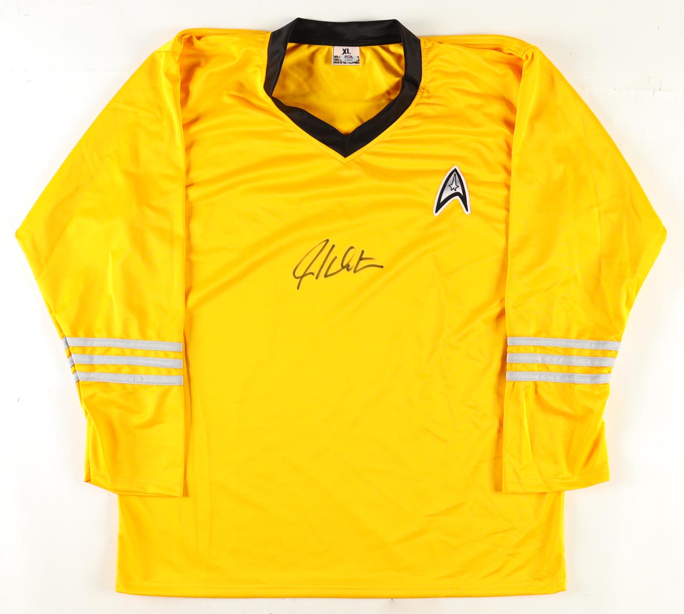William Shatner Signed "Star Trek" Prop Uniform Shirt (PSA) at PristineAuction.com William Shatner Signed "Star Trek" Prop Uniform Shirt (PSA) at PristineAuction.com