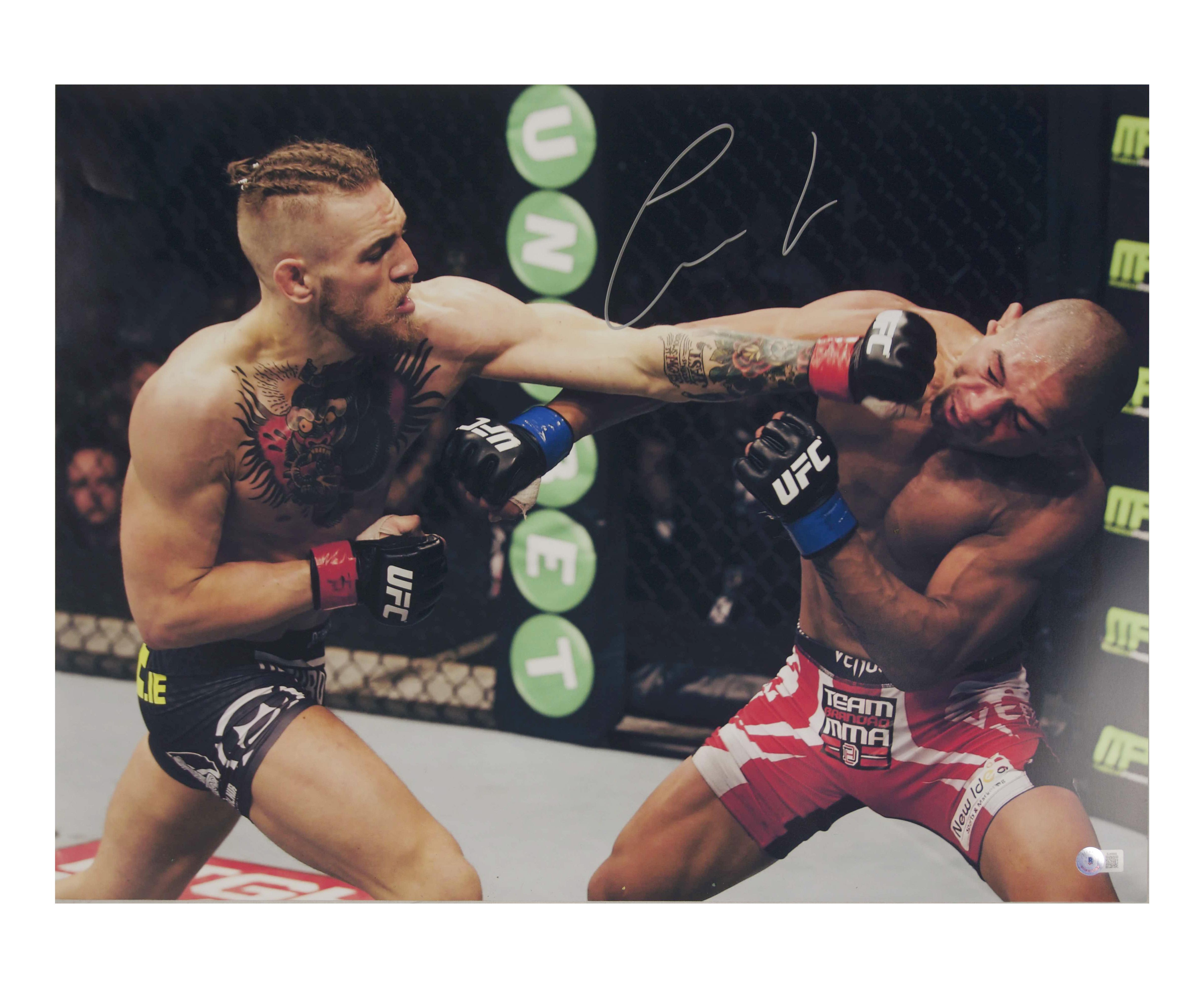 Conor McGregor Signed UFC 18x24 Photo (Beckett) at PristineAuction.com Conor McGregor Signed UFC 18x24 Photo (Beckett) at PristineAuction.com