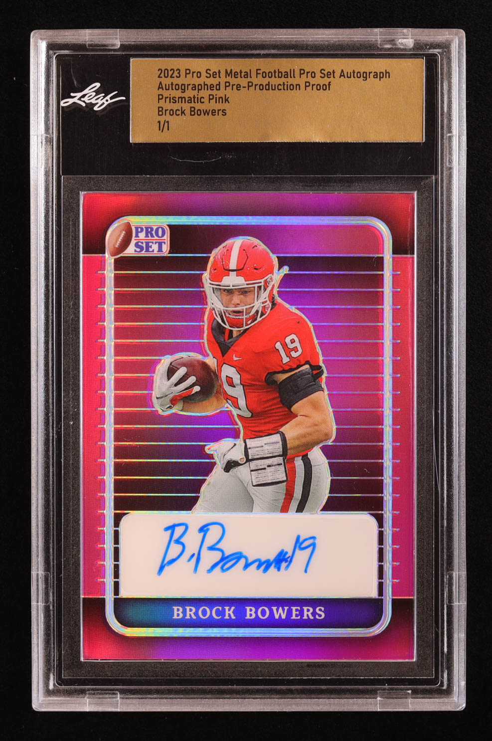 Brock Bowers 2023 Pro Set Metal Football Pro Set Autograph Autographed Pre-Production Proof Prismatic Pink #1/1 RC (Leaf) at PristineAuction.com Brock Bowers 2023 Pro Set Metal Football Pro Set Autograph Autographed Pre-Production Proof Prismatic Pink #1/1 RC (Leaf) at PristineAuction.com