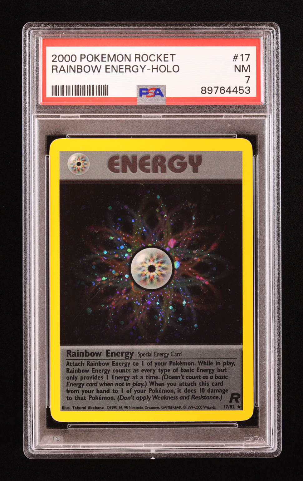 Rainbow Energy Pokemon 2000 Team Rocket #17 Holo (PSA 7) at PristineAuction.com Rainbow Energy Pokemon 2000 Team Rocket #17 Holo (PSA 7) at PristineAuction.com