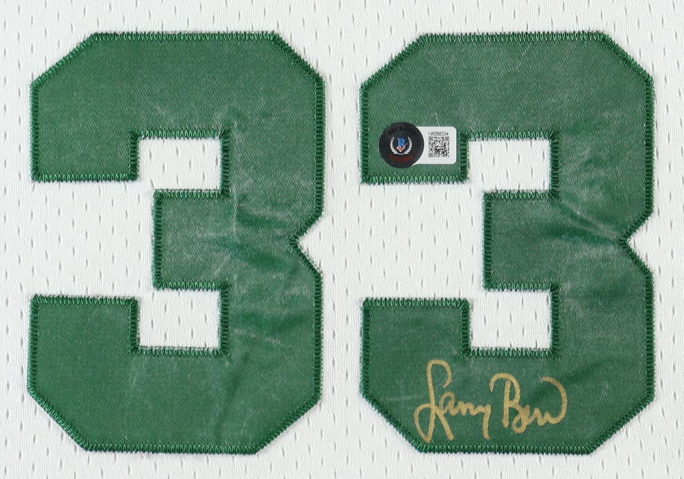 Larry Bird Signed Celtics Vintage Adidas Jersey Custom Framed Display with Pair of Team Logo Patches & Original 1986 Championship Pin (Beckett) at PristineAuction.com Larry Bird Signed Celtics Vintage Adidas Jersey Custom Framed Display with Pair of Team Logo Patches & Original 1986 Championship Pin (Beckett) at PristineAuction.com