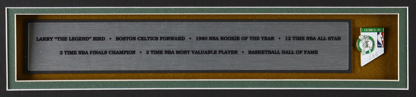 Larry Bird Signed Celtics Vintage Adidas Jersey Custom Framed Display with Pair of Team Logo Patches & Original 1986 Championship Pin (Beckett) at PristineAuction.com Larry Bird Signed Celtics Vintage Adidas Jersey Custom Framed Display with Pair of Team Logo Patches & Original 1986 Championship Pin (Beckett) at PristineAuction.com
