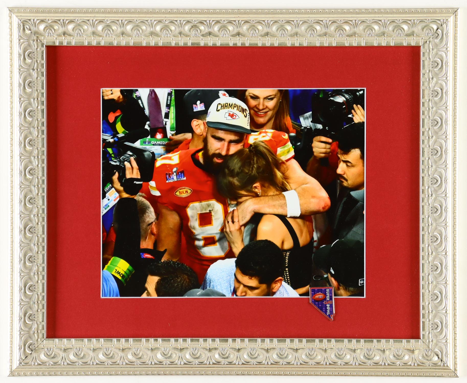 Travis Kelce & Taylor Swift Chiefs Custom Framed Photo with Official Las Vegas Super Bowl LVIII Pin at PristineAuction.com Travis Kelce & Taylor Swift Chiefs Custom Framed Photo with Official Las Vegas Super Bowl LVIII Pin at PristineAuction.com