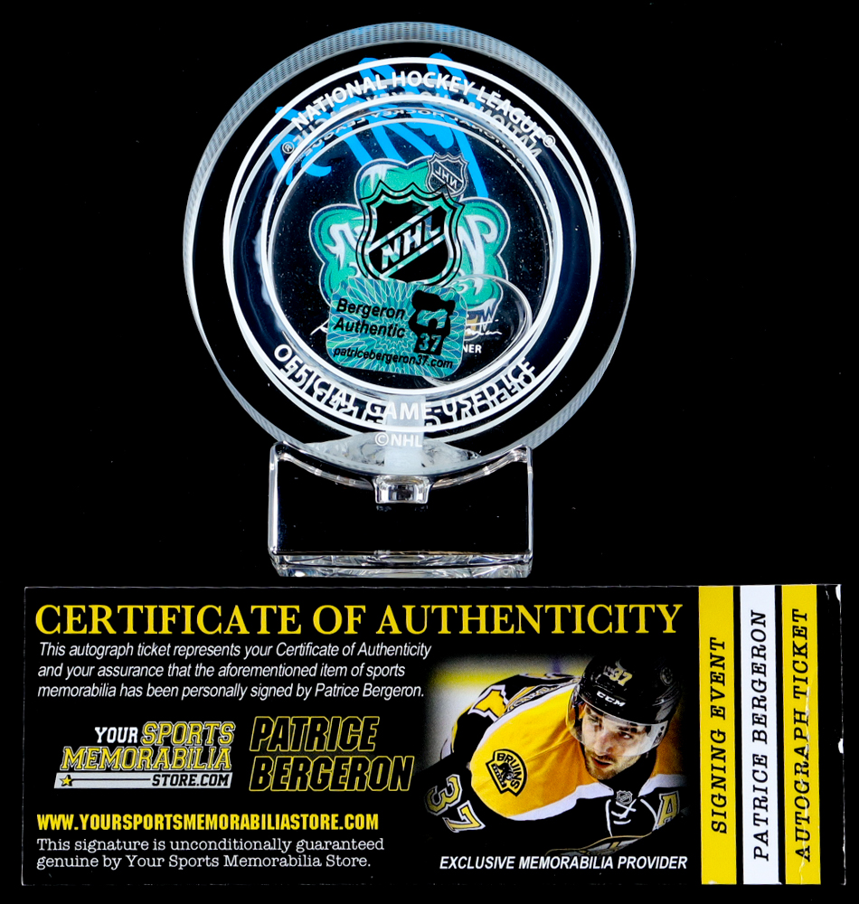 Patrice Bergeron Signed 2019 Winter Classic Logo Glass Hockey Puck with Game-Used Ice Water (YSMS) at PristineAuction.com Patrice Bergeron Signed 2019 Winter Classic Logo Glass Hockey Puck with Game-Used Ice Water (YSMS) at PristineAuction.com
