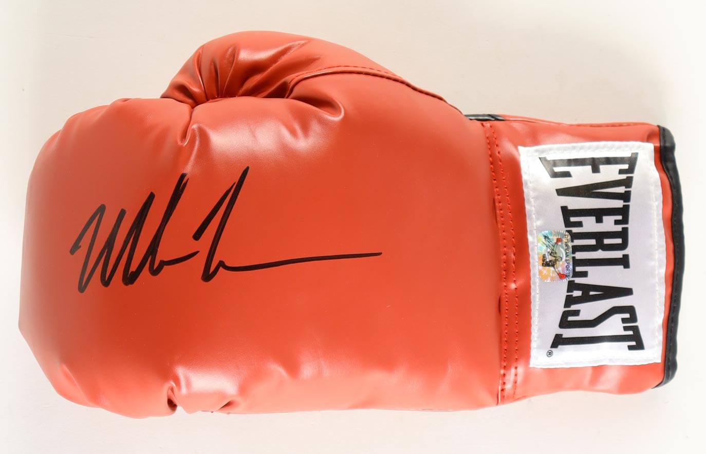 Mike Tyson Signed Everlast Boxing Glove with Photoback Display Case & Wrist Wrap (Tyson) at PristineAuction.com Mike Tyson Signed Everlast Boxing Glove with Photoback Display Case & Wrist Wrap (Tyson) at PristineAuction.com