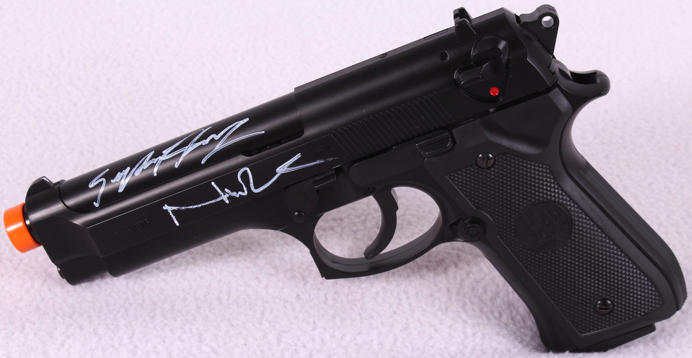 Norman Reedus & Sean Patrick Flanery Signed "Boondock Saints" Replica Pistol (Radtke COA) at PristineAuction.com Norman Reedus & Sean Patrick Flanery Signed "Boondock Saints" Replica Pistol (Radtke COA) at PristineAuction.com