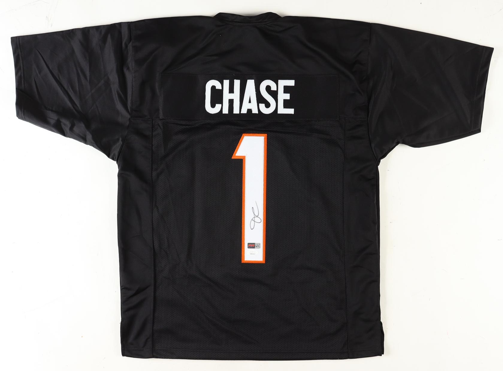 Ja'Marr Chase Signed Jersey (JSA & PIA) at PristineAuction.com Ja'Marr Chase Signed Jersey (JSA & PIA) at PristineAuction.com