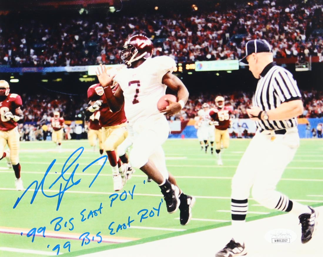 Michael Vick Signed Virginia Tech Hokies 8x10 Photo Inscribed "'99 Big East POY'" & "'99 Big East ROY'" (JSA) at PristineAuction.com Michael Vick Signed Virginia Tech Hokies 8x10 Photo Inscribed "'99 Big East POY'" & "'99 Big East ROY'" (JSA) at PristineAuction.com