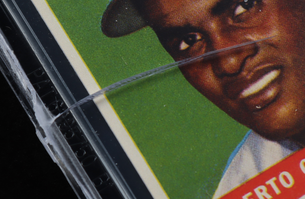 Roberto Clemente Jr. Signed LE 1955 Topps Roberto Clemente Reprint RC #164 "Spanish Back" (BGS) at PristineAuction.com Roberto Clemente Jr. Signed LE 1955 Topps Roberto Clemente Reprint RC #164 "Spanish Back" (BGS) at PristineAuction.com