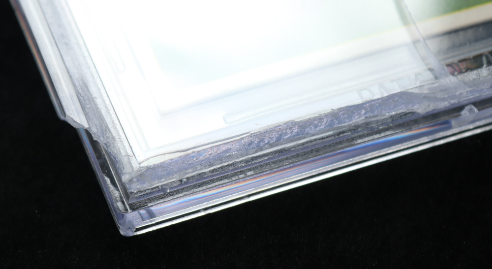 Roberto Clemente Jr. Signed LE 1955 Topps Roberto Clemente Reprint RC #164 "Spanish Back" (BGS) at PristineAuction.com Roberto Clemente Jr. Signed LE 1955 Topps Roberto Clemente Reprint RC #164 "Spanish Back" (BGS) at PristineAuction.com