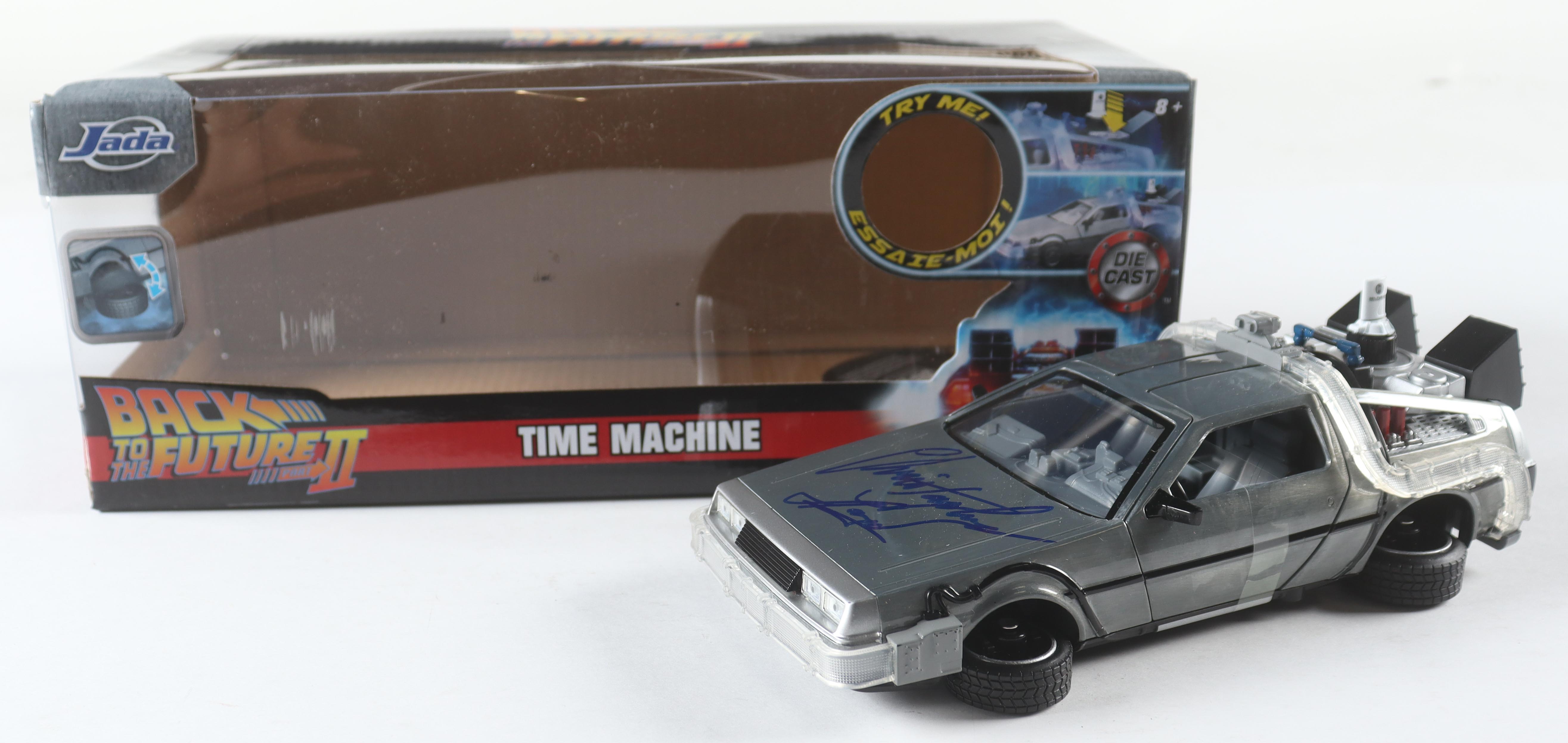 Christopher Lloyd Signed "Back to the Future Part 2" DeLorean Time Machine 1:24 Scale Die-Cast Car (Beckett) at PristineAuction.com Christopher Lloyd Signed "Back to the Future Part 2" DeLorean Time Machine 1:24 Scale Die-Cast Car (Beckett) at PristineAuction.com