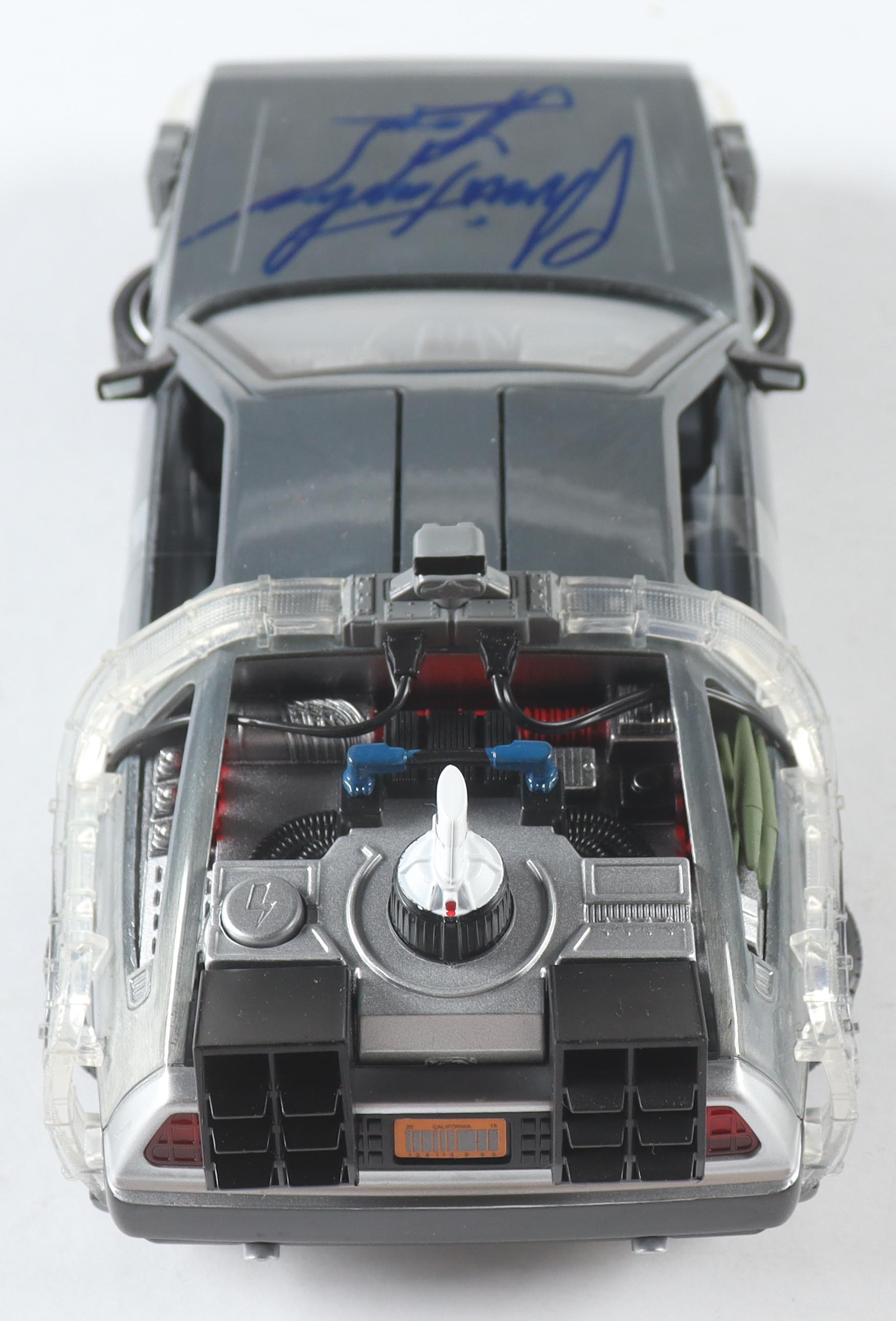 Christopher Lloyd Signed "Back to the Future Part 2" DeLorean Time Machine 1:24 Scale Die-Cast Car (Beckett) at PristineAuction.com Christopher Lloyd Signed "Back to the Future Part 2" DeLorean Time Machine 1:24 Scale Die-Cast Car (Beckett) at PristineAuction.com