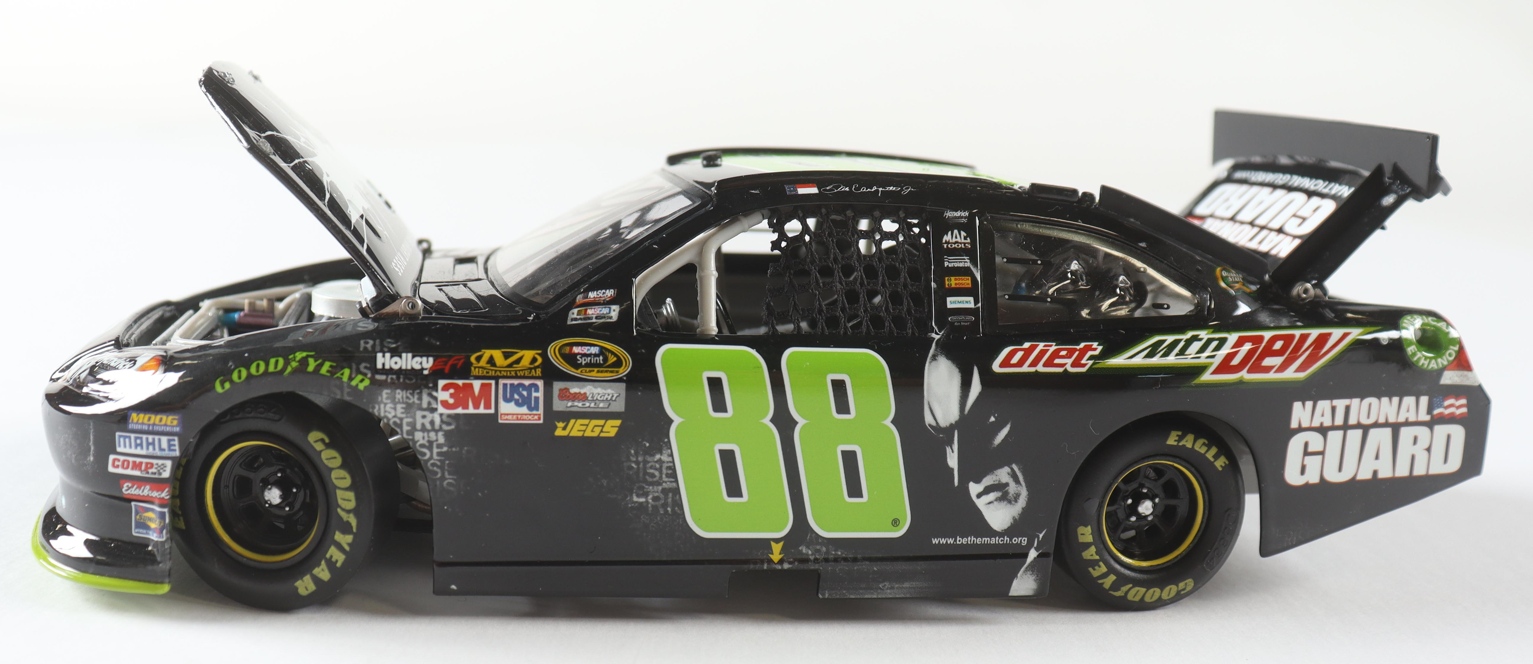 Dale Earnhardt Jr. Signed LE NASCAR #88 Diet Dew Dark Knight 2012 Impala 1:24 Scale Diecast Car (JSA) at PristineAuction.com Dale Earnhardt Jr. Signed LE NASCAR #88 Diet Dew Dark Knight 2012 Impala 1:24 Scale Diecast Car (JSA) at PristineAuction.com