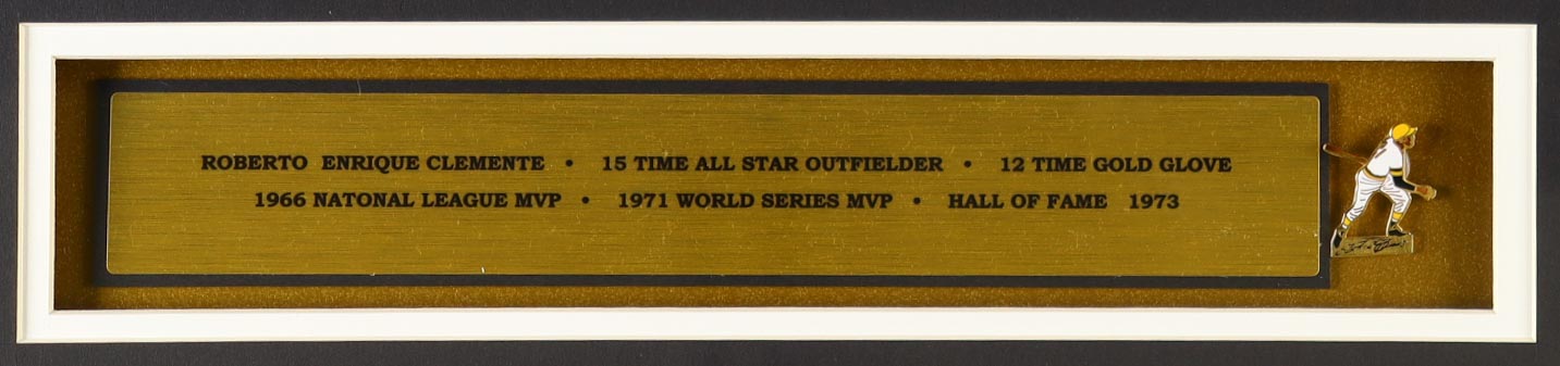 Roberto Clemente Custom Framed Jersey Display With Vintage Robert Clemente Pirates Pin at PristineAuction.com Roberto Clemente Custom Framed Jersey Display With Vintage Robert Clemente Pirates Pin at PristineAuction.com