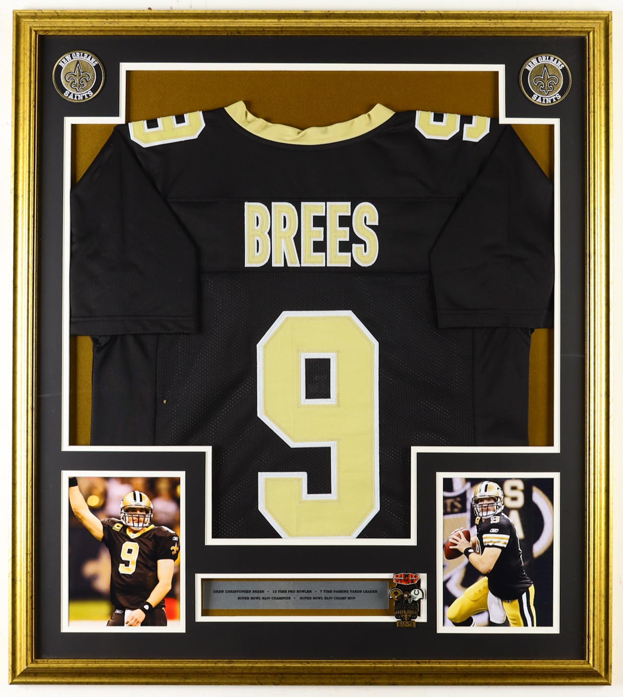 Drew Brees Custom Framed Jersey With Super Bowl Official XLIV Pin (2) Cloth Team Logo Patches at PristineAuction.com Drew Brees Custom Framed Jersey With Super Bowl Official XLIV Pin (2) Cloth Team Logo Patches at PristineAuction.com