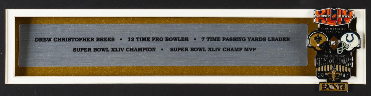 Drew Brees Custom Framed Jersey With Super Bowl Official XLIV Pin (2) Cloth Team Logo Patches at PristineAuction.com Drew Brees Custom Framed Jersey With Super Bowl Official XLIV Pin (2) Cloth Team Logo Patches at PristineAuction.com
