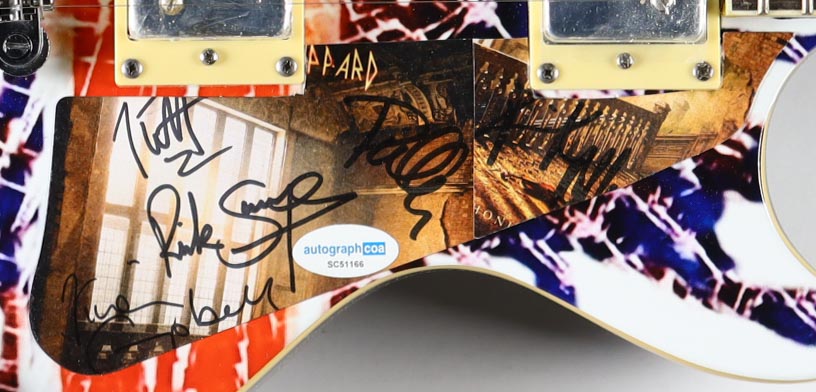 Def Leppard Custom Electric 12-String Guitar Band-Signed By (5) With Joe Elliot, Phil Collen, Rick Allen, Rick Savage & Vivian Campbell (AutographCOA & AutographPros) at PristineAuction.com Def Leppard Custom Electric 12-String Guitar Band-Signed By (5) With Joe Elliot, Phil Collen, Rick Allen, Rick Savage & Vivian Campbell (AutographCOA & AutographPros) at PristineAuction.com