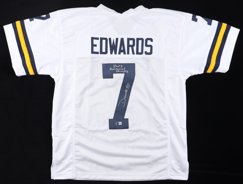 Donovan Edwards Signed Jersey Inscribed "2023 National Champs" (Beckett) at PristineAuction.com Donovan Edwards Signed Jersey Inscribed "2023 National Champs" (Beckett) at PristineAuction.com
