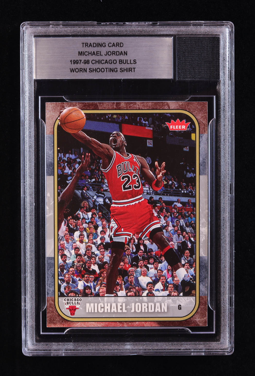 Michael Jordan 2007 Fleer Michael Jordan #16 with Worn Shooting Shirt Piece (BGS) at PristineAuction.com Michael Jordan 2007 Fleer Michael Jordan #16 with Worn Shooting Shirt Piece (BGS) at PristineAuction.com