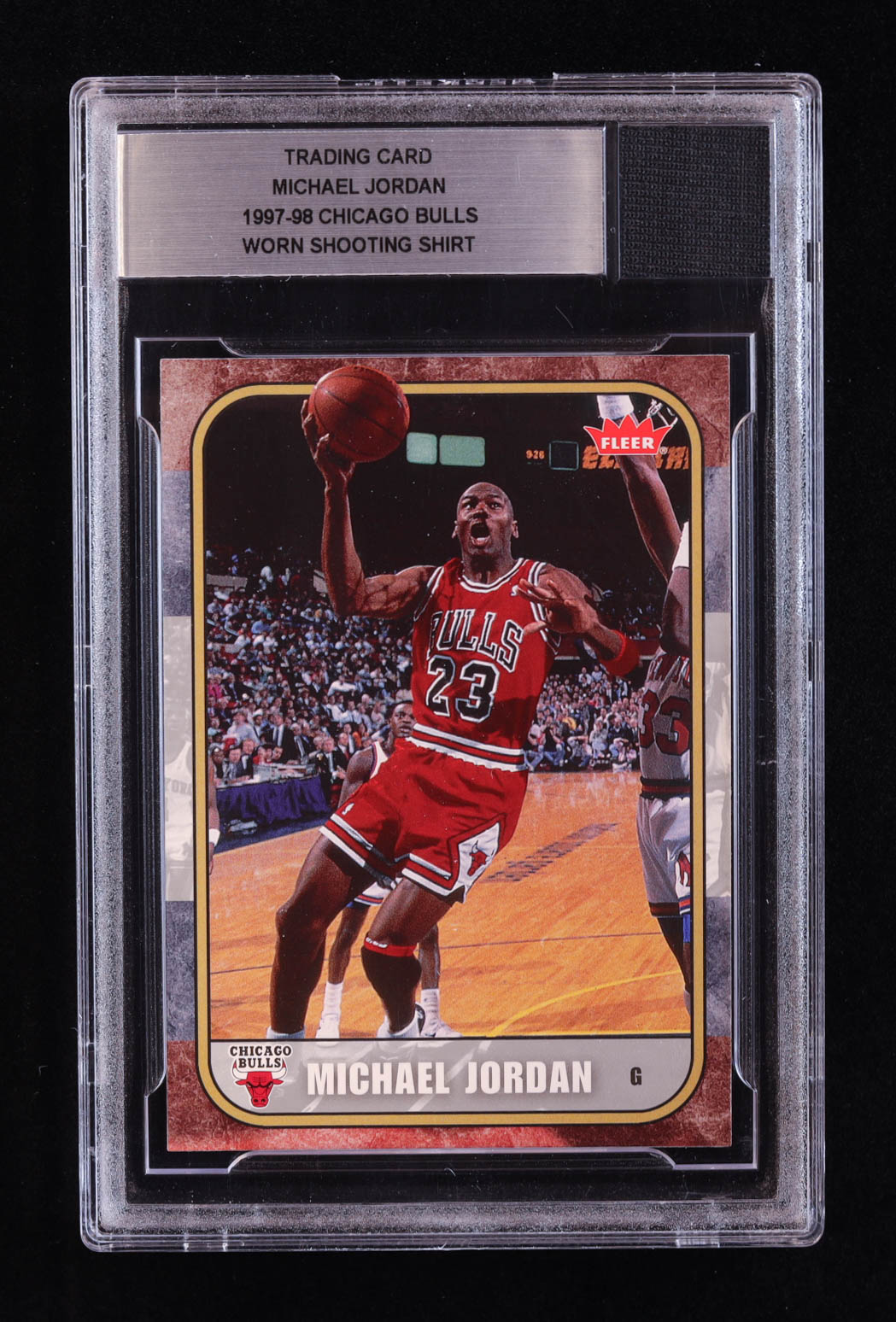 Michael Jordan 2007 Fleer Michael Jordan #14 with Worn Shooting Shirt Piece (BGS) at PristineAuction.com Michael Jordan 2007 Fleer Michael Jordan #14 with Worn Shooting Shirt Piece (BGS) at PristineAuction.com