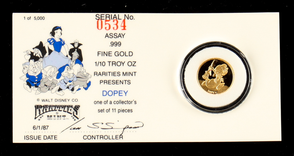 1987 "Snow White's 50th Anniversary" Dopey 1/10 Troy Oz. .999 Fine Gold Coin in Assay at PristineAuction.com 1987 "Snow White's 50th Anniversary" Dopey 1/10 Troy Oz. .999 Fine Gold Coin in Assay at PristineAuction.com
