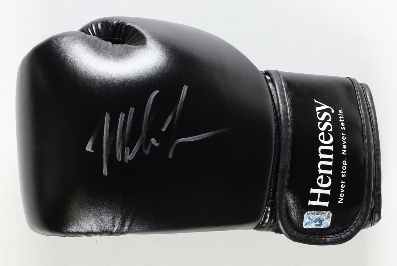 Mike Tyson Signed Hennessy Fight Sponsor Only Black Boxing Glove In Display Case (Tyson) at PristineAuction.com Mike Tyson Signed Hennessy Fight Sponsor Only Black Boxing Glove In Display Case (Tyson) at PristineAuction.com