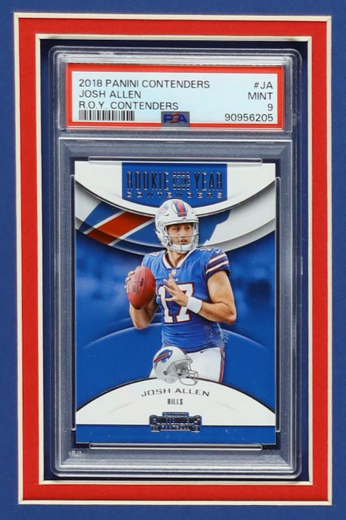 Josh Allen Signed Custom Framed Jersey with 2018 Panini Contenders Rookie of the Year Contenders #5 RC (PSA 9) & 2018 Score #350 RC (PSA 10) (Fanatics) at PristineAuction.com Josh Allen Signed Custom Framed Jersey with 2018 Panini Contenders Rookie of the Year Contenders #5 RC (PSA 9) & 2018 Score #350 RC (PSA 10) (Fanatics) at PristineAuction.com