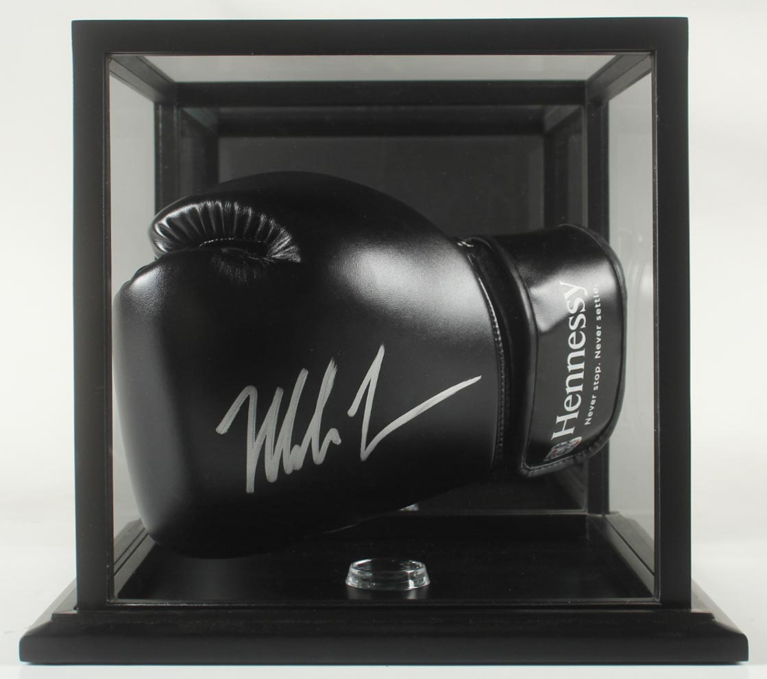 Mike Tyson Signed Hennessy Fight Sponsor Only Black Boxing Glove In Display Case (Tyson) at PristineAuction.com Mike Tyson Signed Hennessy Fight Sponsor Only Black Boxing Glove In Display Case (Tyson) at PristineAuction.com