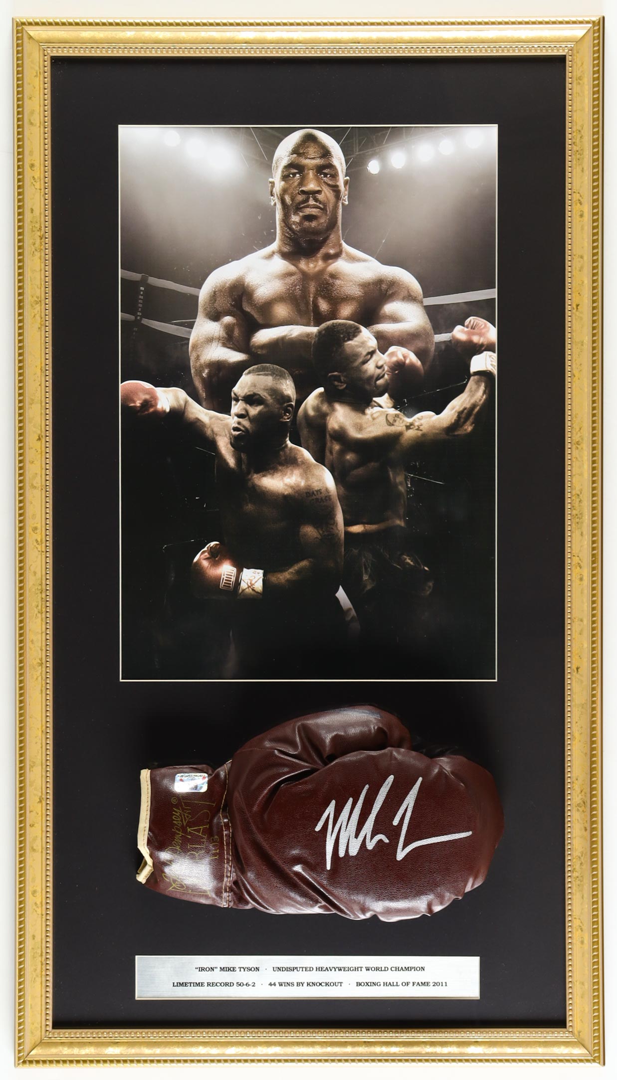 Mike Tyson Signed Custom Framed Spalding Boxing Glove Display with Photo (Tyson) at PristineAuction.com Mike Tyson Signed Custom Framed Spalding Boxing Glove Display with Photo (Tyson) at PristineAuction.com