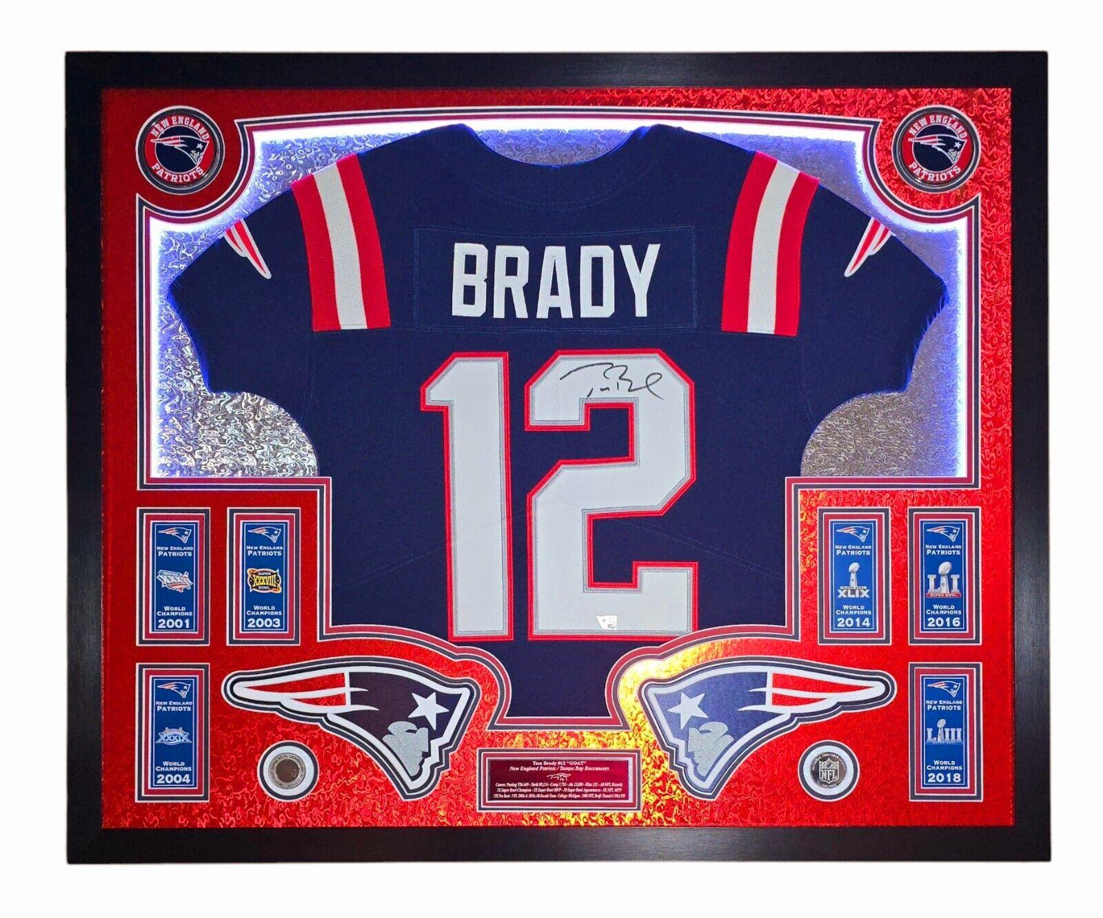 Tom Brady Signed LE Patriots Custom Framed LED Backlit Nike Elite Jersey Display with (6) Replica Super Bowl Banners (Fanatics) at PristineAuction.com Tom Brady Signed LE Patriots Custom Framed LED Backlit Nike Elite Jersey Display with (6) Replica Super Bowl Banners (Fanatics) at PristineAuction.com