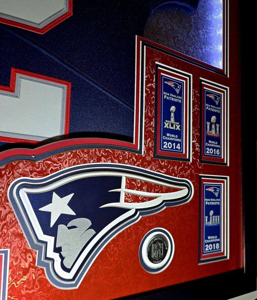 Tom Brady Signed LE Patriots Custom Framed LED Backlit Nike Elite Jersey Display with (6) Replica Super Bowl Banners (Fanatics) at PristineAuction.com Tom Brady Signed LE Patriots Custom Framed LED Backlit Nike Elite Jersey Display with (6) Replica Super Bowl Banners (Fanatics) at PristineAuction.com