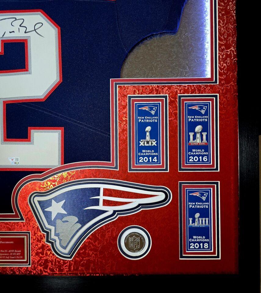 Tom Brady Signed LE Patriots Custom Framed LED Backlit Nike Elite Jersey Display with (6) Replica Super Bowl Banners (Fanatics) at PristineAuction.com Tom Brady Signed LE Patriots Custom Framed LED Backlit Nike Elite Jersey Display with (6) Replica Super Bowl Banners (Fanatics) at PristineAuction.com