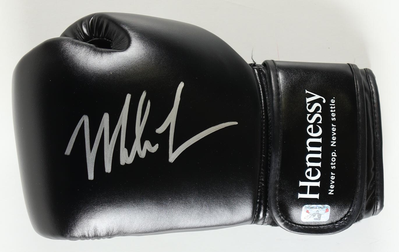 Mike Tyson Signed Hennessy Sponsor Only Boxing Glove (Tyson) at PristineAuction.com Mike Tyson Signed Hennessy Sponsor Only Boxing Glove (Tyson) at PristineAuction.com