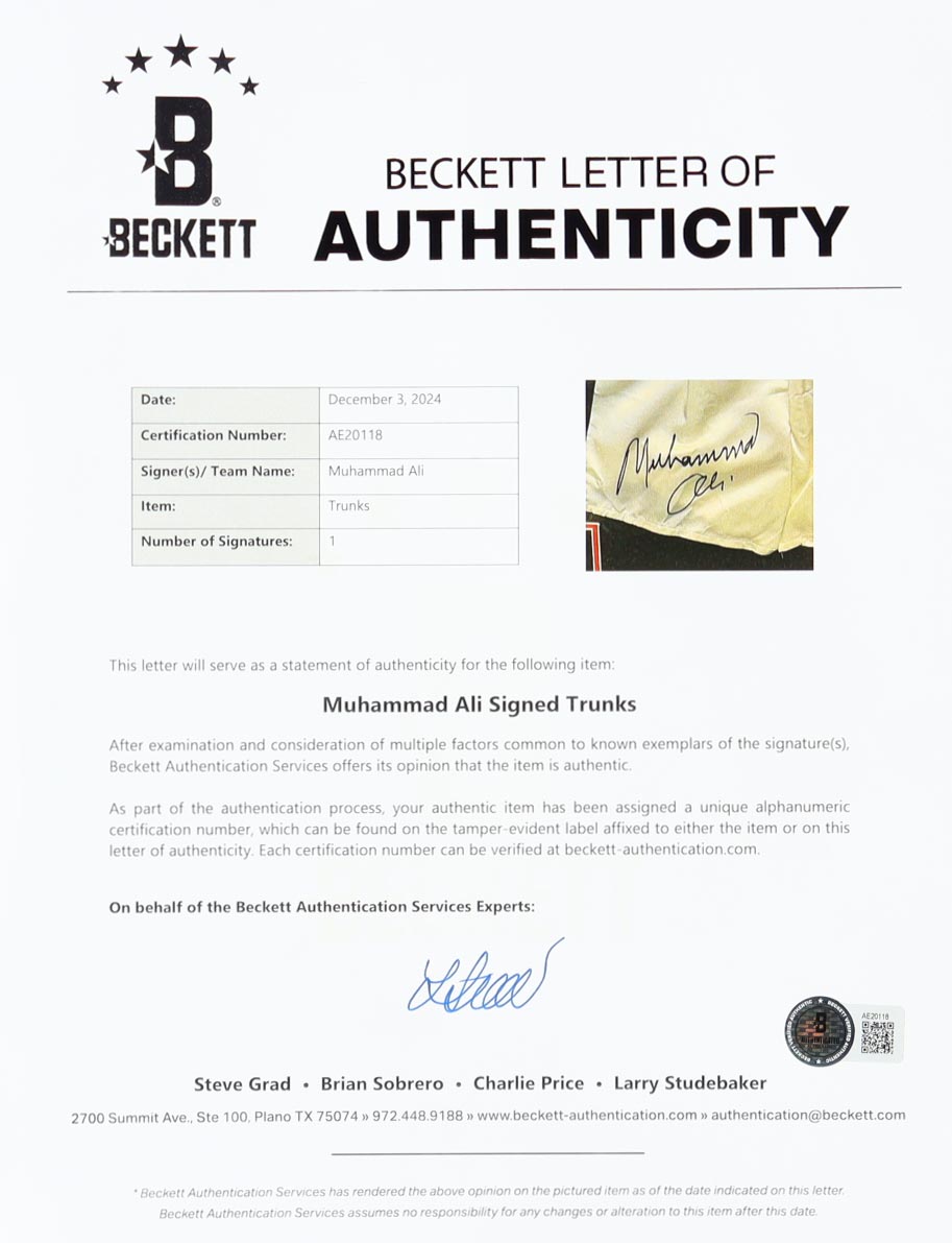 Muhammad Ali Signed 33.5x41.5 Custom Framed Boxing Trunks and Photo Display (Beckett) at PristineAuction.com Muhammad Ali Signed 33.5x41.5 Custom Framed Boxing Trunks and Photo Display (Beckett) at PristineAuction.com