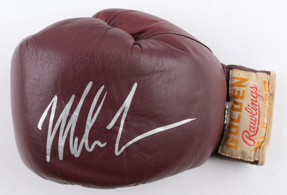 Mike Tyson Signed Rawlings Golden Gloves Boxing Glove (Tyson) at PristineAuction.com Mike Tyson Signed Rawlings Golden Gloves Boxing Glove (Tyson) at PristineAuction.com