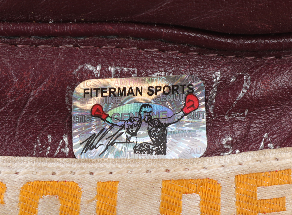 Mike Tyson Signed Rawlings Golden Gloves Boxing Glove (Tyson) at PristineAuction.com Mike Tyson Signed Rawlings Golden Gloves Boxing Glove (Tyson) at PristineAuction.com