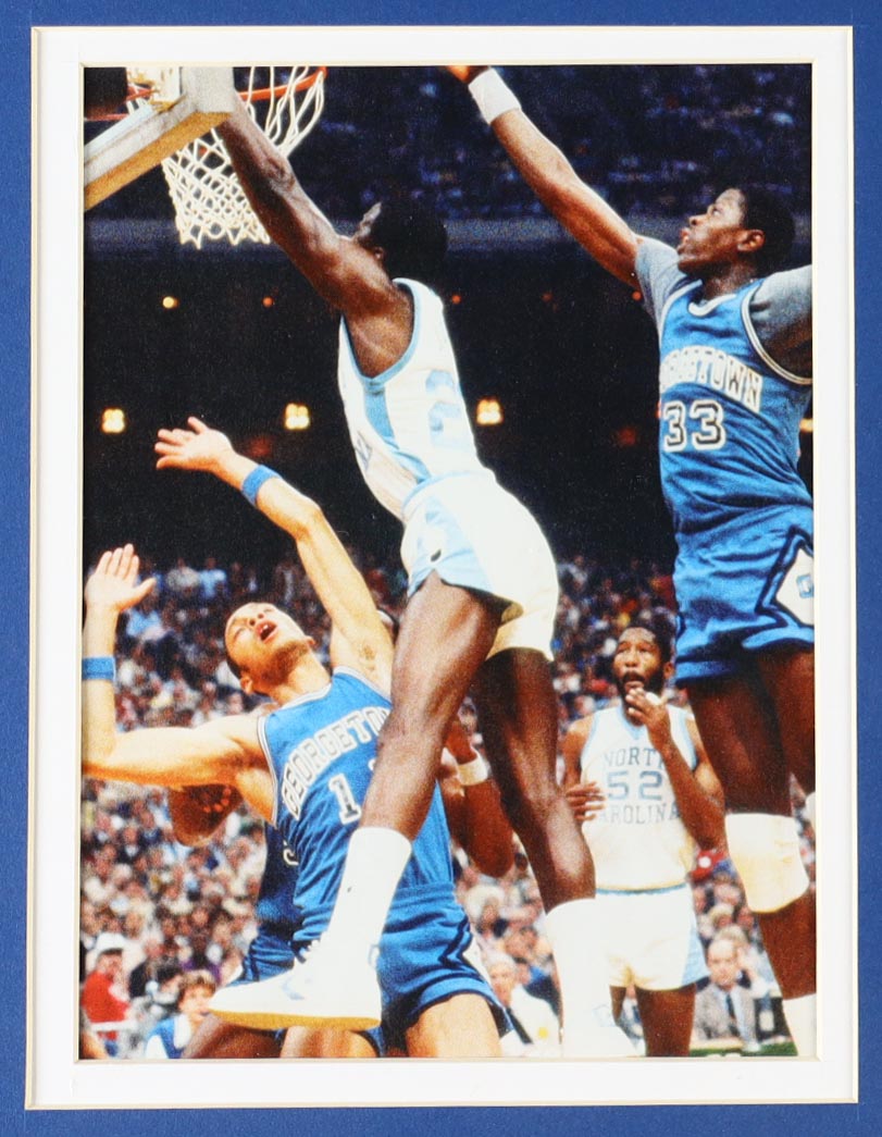 Michael Jordan Custom Framed Jersey Display With Vintage Tar Heels Pin & (2) Vintage Team Logo Ceramic Badges at PristineAuction.com Michael Jordan Custom Framed Jersey Display With Vintage Tar Heels Pin & (2) Vintage Team Logo Ceramic Badges at PristineAuction.com