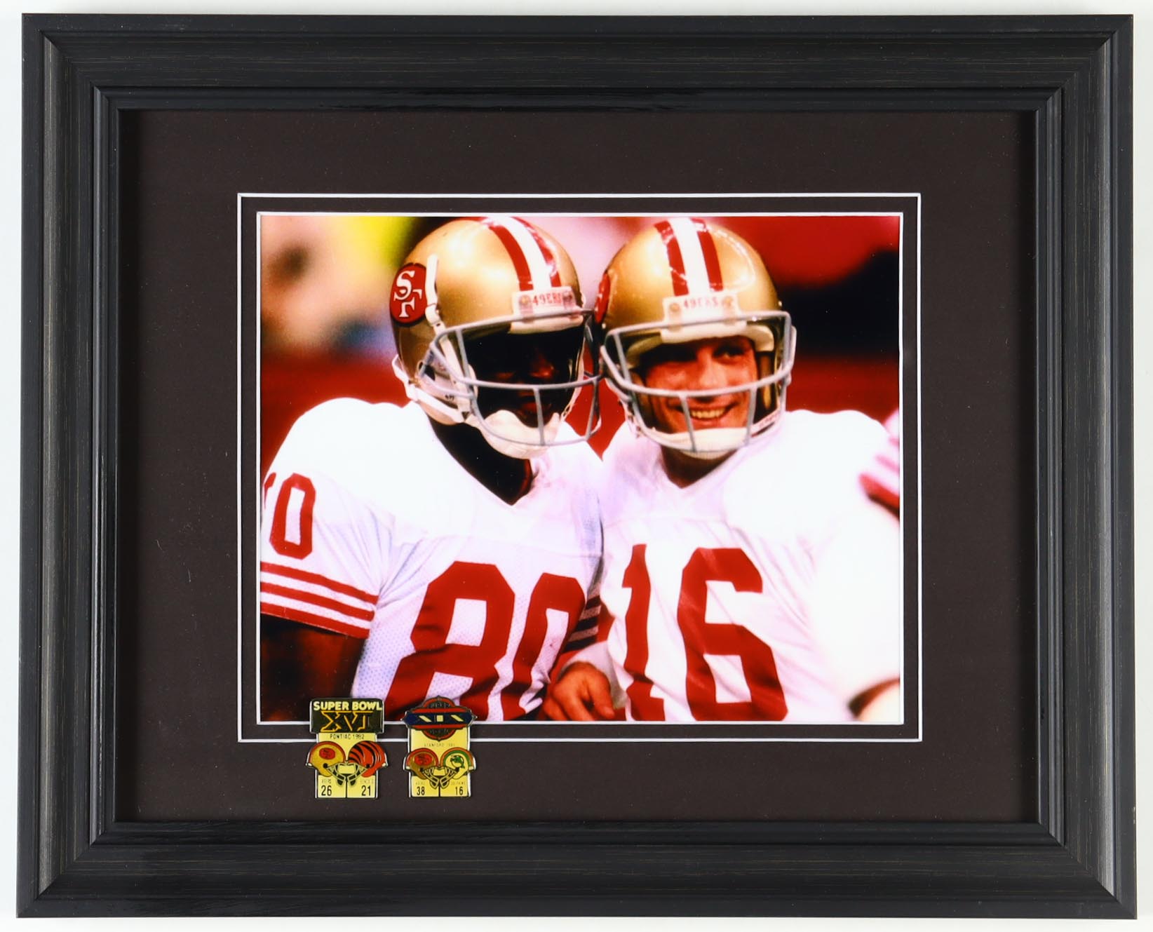 Jerry Rice & Joe Montana Custom Framed Photo with Official Super Bowl XVI & XIX Vintage 49ers Pins at PristineAuction.com Jerry Rice & Joe Montana Custom Framed Photo with Official Super Bowl XVI & XIX Vintage 49ers Pins at PristineAuction.com