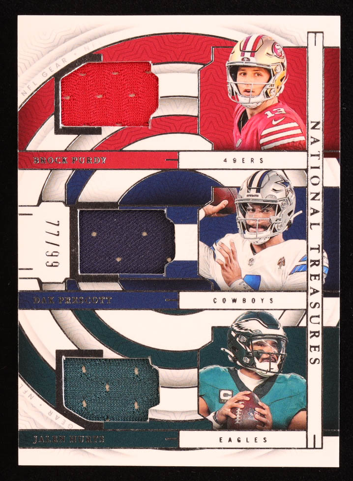 Brock Purdy / Dak Prescott / Jalen Hurts 2023 Panini National Treasures NFL Gear Trio Materials #20 #77/99 at PristineAuction.com Brock Purdy / Dak Prescott / Jalen Hurts 2023 Panini National Treasures NFL Gear Trio Materials #20 #77/99 at PristineAuction.com