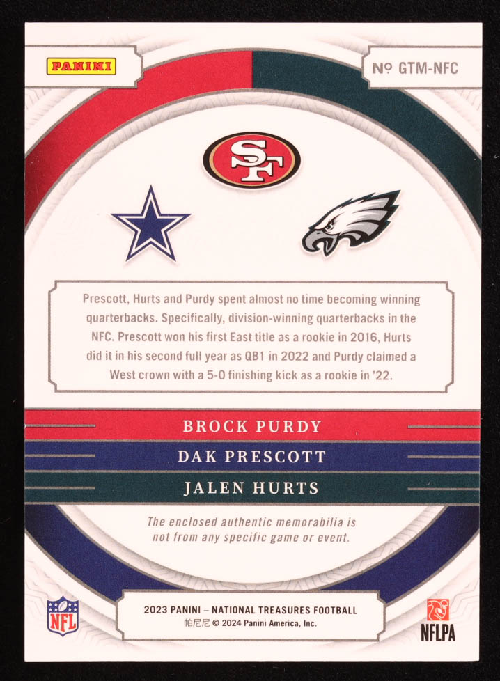 Brock Purdy / Dak Prescott / Jalen Hurts 2023 Panini National Treasures NFL Gear Trio Materials #20 #77/99 at PristineAuction.com Brock Purdy / Dak Prescott / Jalen Hurts 2023 Panini National Treasures NFL Gear Trio Materials #20 #77/99 at PristineAuction.com