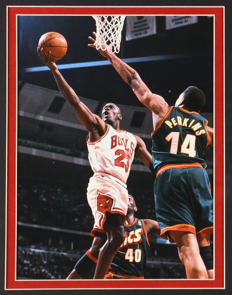 Michael Jordan Custom Framed Jersey Display with (4) LE Championship Pins & (2) Metal Team Logo Emblems at PristineAuction.com Michael Jordan Custom Framed Jersey Display with (4) LE Championship Pins & (2) Metal Team Logo Emblems at PristineAuction.com