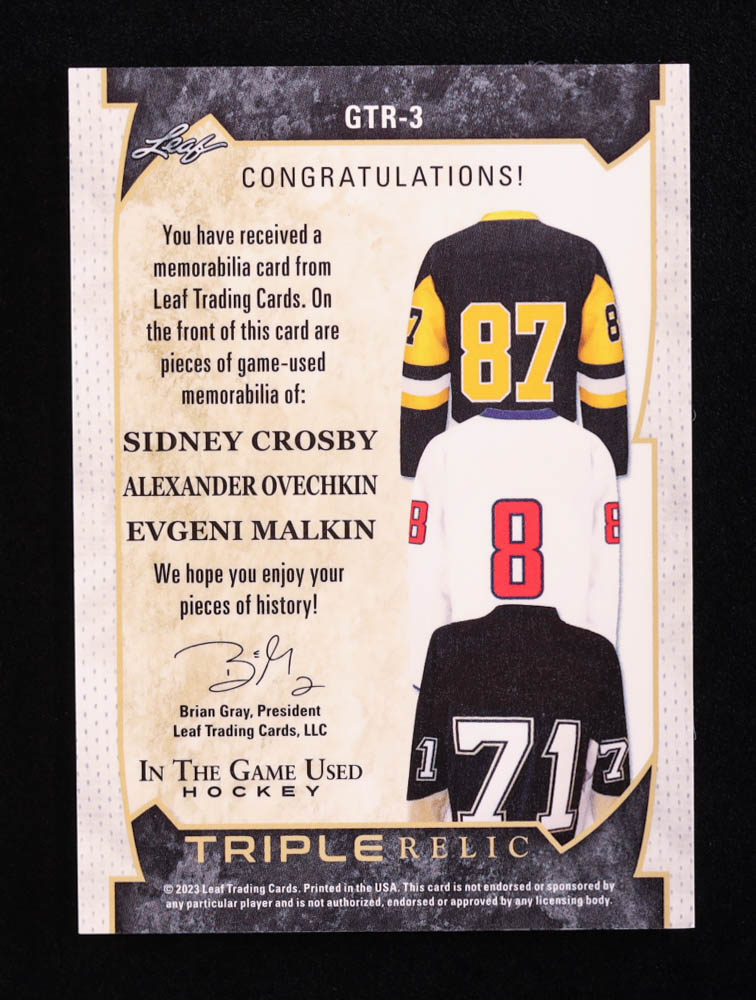 Sidney Crosby / Alexander Ovechkin / Evgeni Malkin 2023 ITG Used Sports Triple Relic Spectrum Gold #GTR3 #1/1 at PristineAuction.com Sidney Crosby / Alexander Ovechkin / Evgeni Malkin 2023 ITG Used Sports Triple Relic Spectrum Gold #GTR3 #1/1 at PristineAuction.com