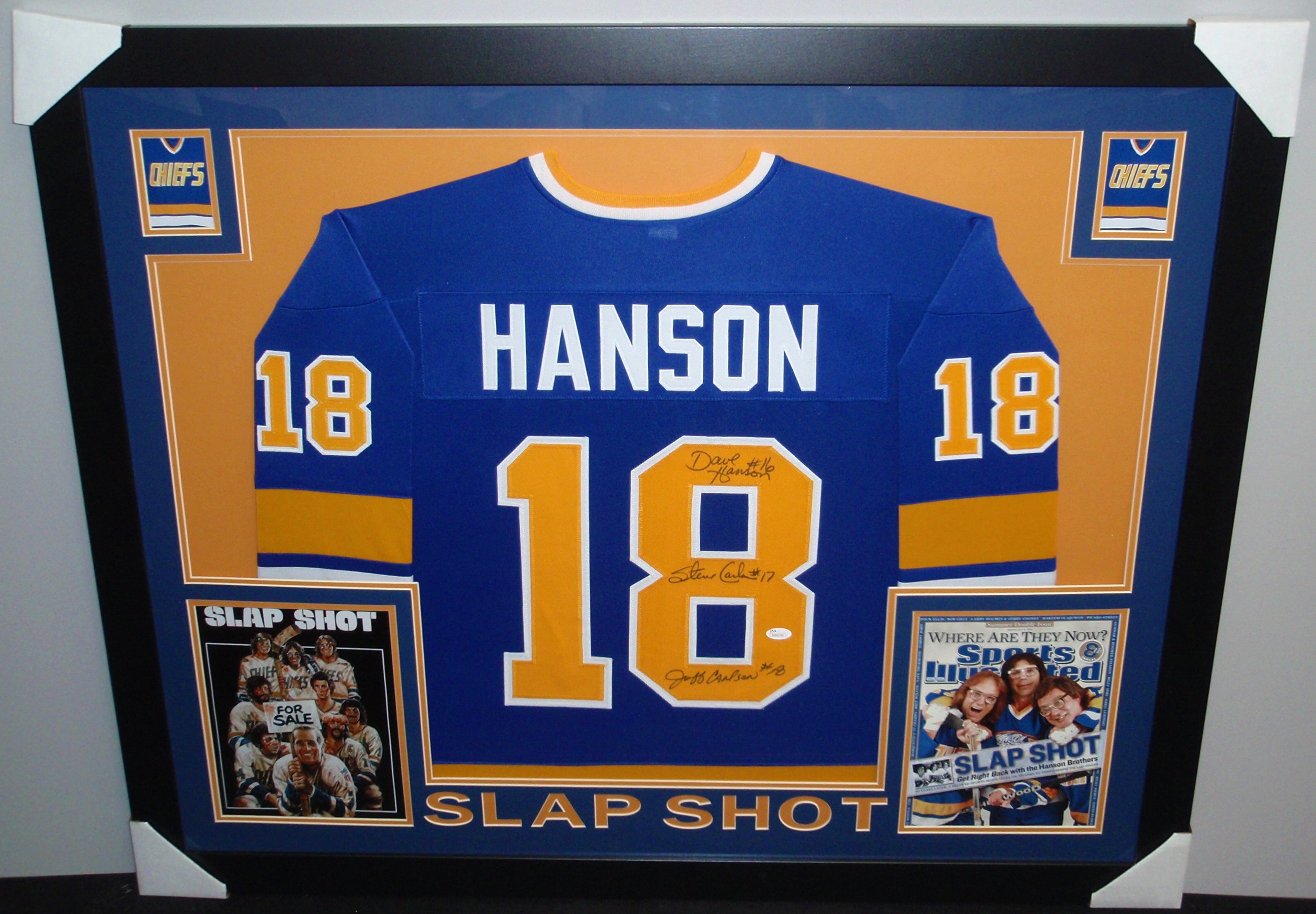 Hanson Brothers Signed "Slap Shot" Chiefs 35x43 Custom Framed Jersey Signed by (3) with Dave Hanson, Steve Carlson & Jeff Carlson (JSA COA) at PristineAuction.com Hanson Brothers Signed "Slap Shot" Chiefs 35x43 Custom Framed Jersey Signed by (3) with Dave Hanson, Steve Carlson & Jeff Carlson (JSA COA) at PristineAuction.com