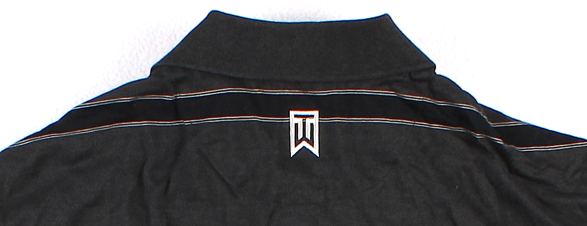 Tiger Woods Signed Tournament Worn Black Nike Golf Shirt #1/1 (UDA COA) at PristineAuction.com Tiger Woods Signed Tournament Worn Black Nike Golf Shirt #1/1 (UDA COA) at PristineAuction.com