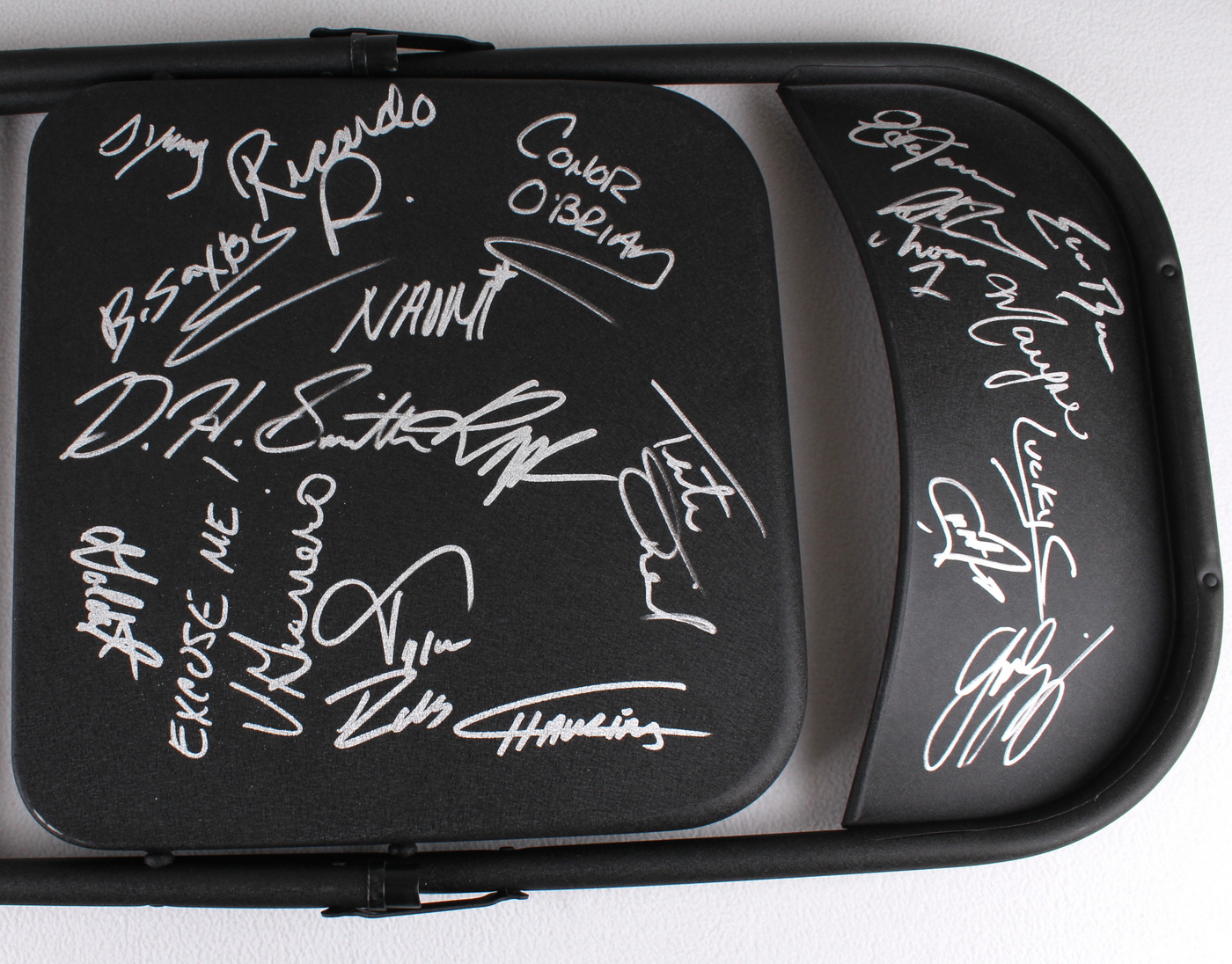 WWE Black Folding Chair Signed by (19) with Vickie Guerrero, Maryse Ouellet, Conor O'Brian (JSA ALOA) at PristineAuction.com WWE Black Folding Chair Signed by (19) with Vickie Guerrero, Maryse Ouellet, Conor O'Brian (JSA ALOA) at PristineAuction.com